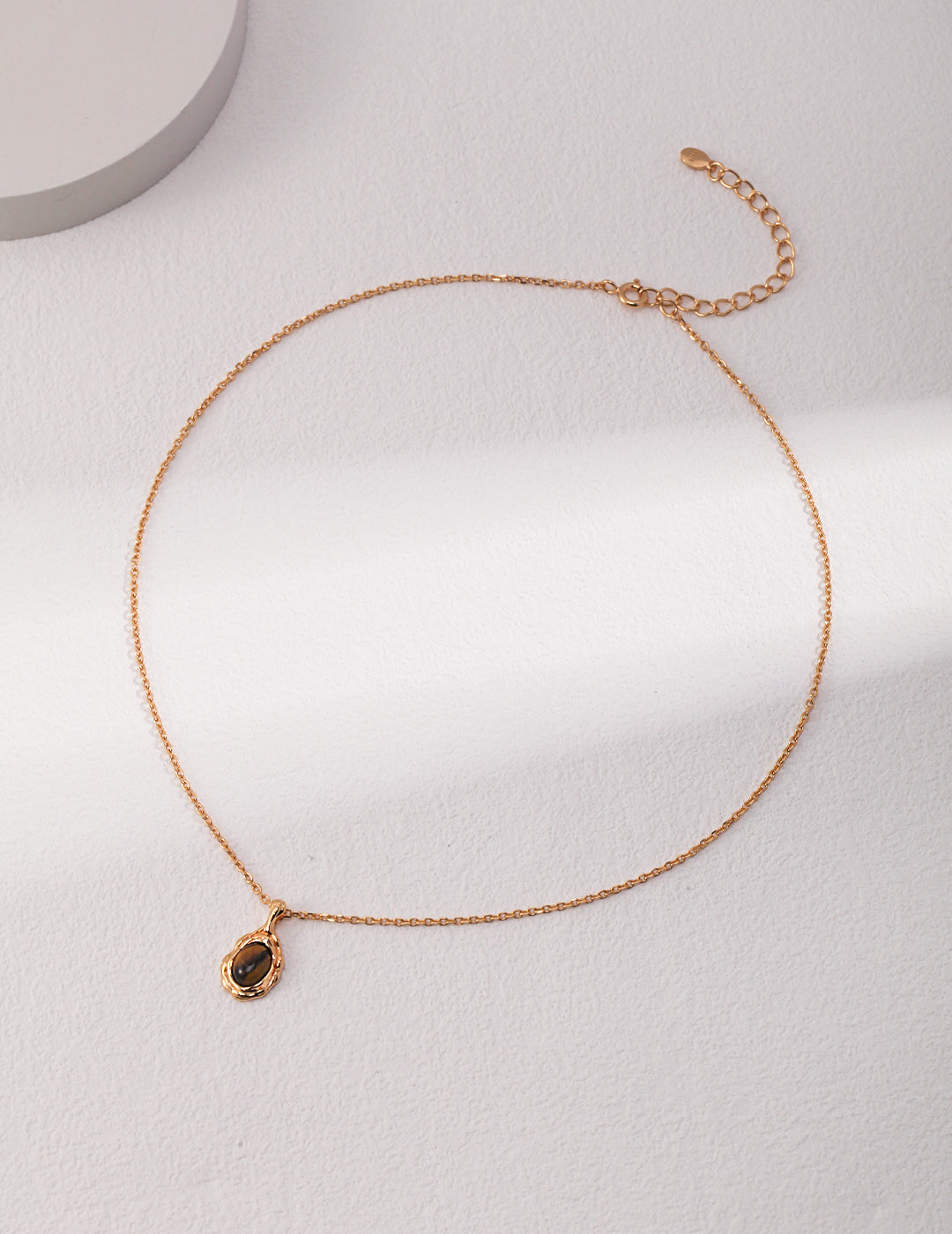 Pure silver necklace with a tiger eye stone pendant